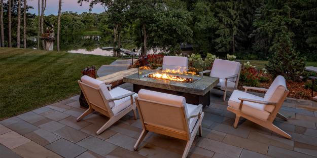 bluestone patio with outdoor furniture, gas fire table