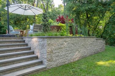 modular brick retaining wall patio with built in planters