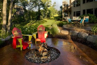 Stamped concrete fire circle firepit patio design