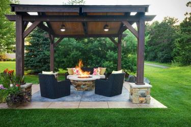 wheel chair accessible backyard outdoor living room with fire feature