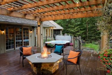 Deck with Firetable and Hot Tub in an Award-Winning Landscape