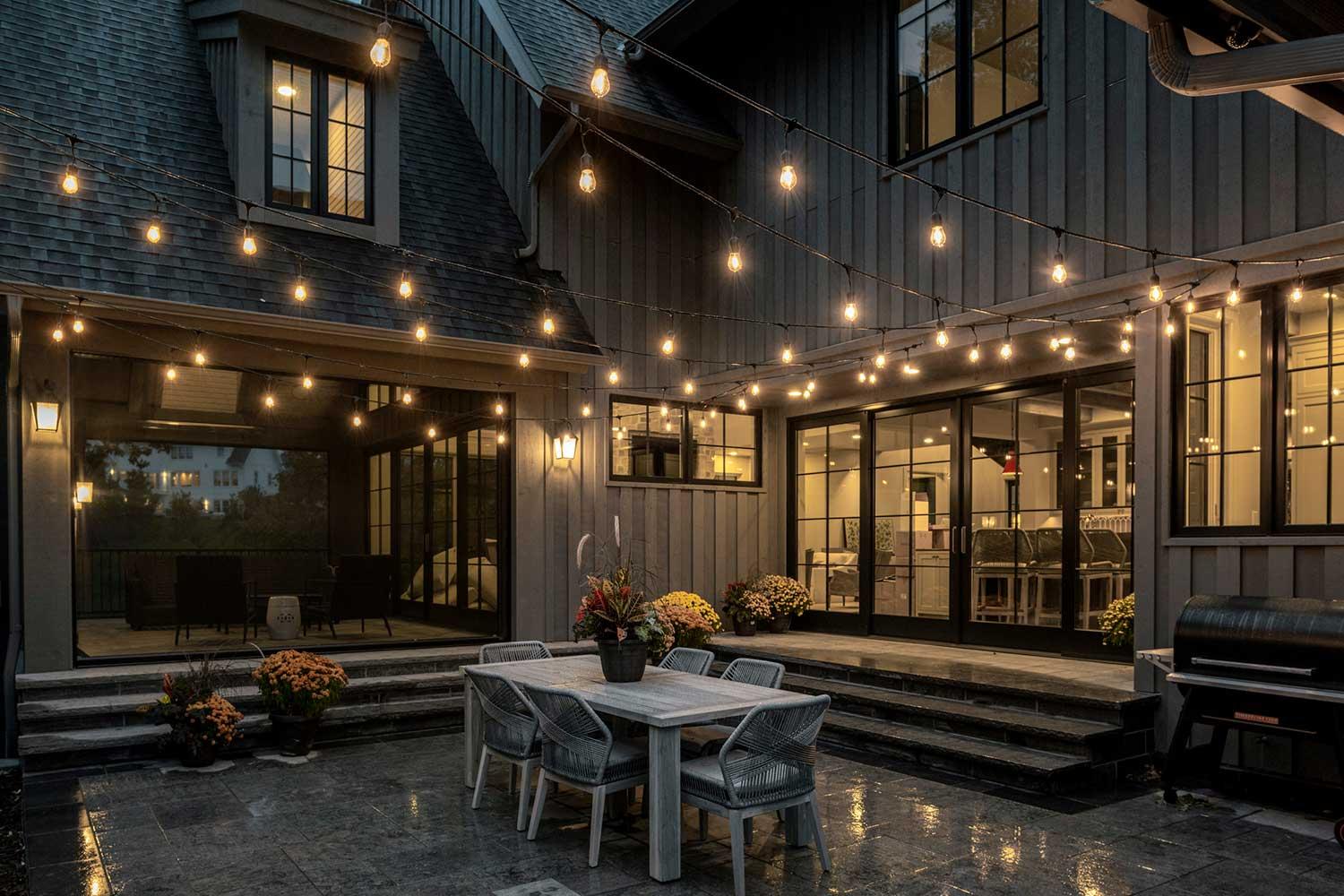 dining courtyard patio with hanging bauble lights