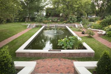 formal brick court yard garden with reflecting pool and fountain