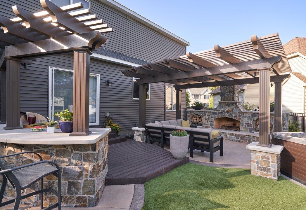 Patio & deck with pergola, wood burning fireplace and bar 