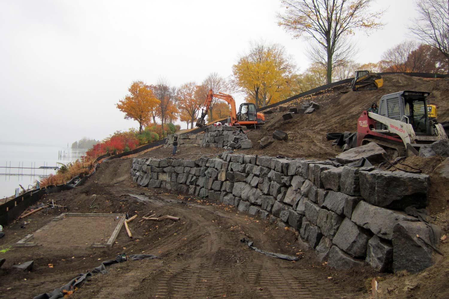 Massive boulder wall under construction