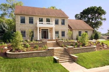 front yard landscaping and retaining walls with curb appeal