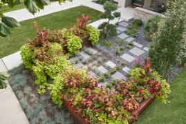 vibrant garden with corten planters