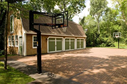 brick paver driveway basketball court in minnesota