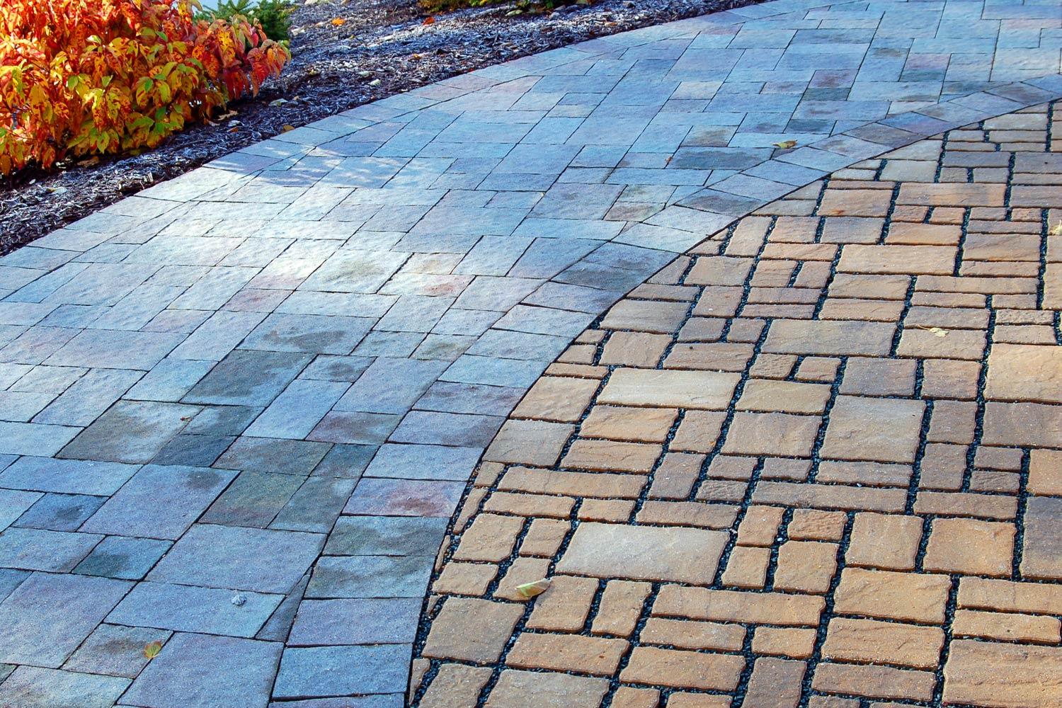 Permeable paver patio with contrasting paver textures and styles.