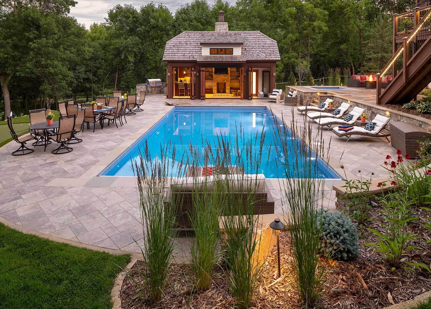 Lake Minnetonka backyard plunge pool and hot tub, middle patio with fire, kitchen and dining patio